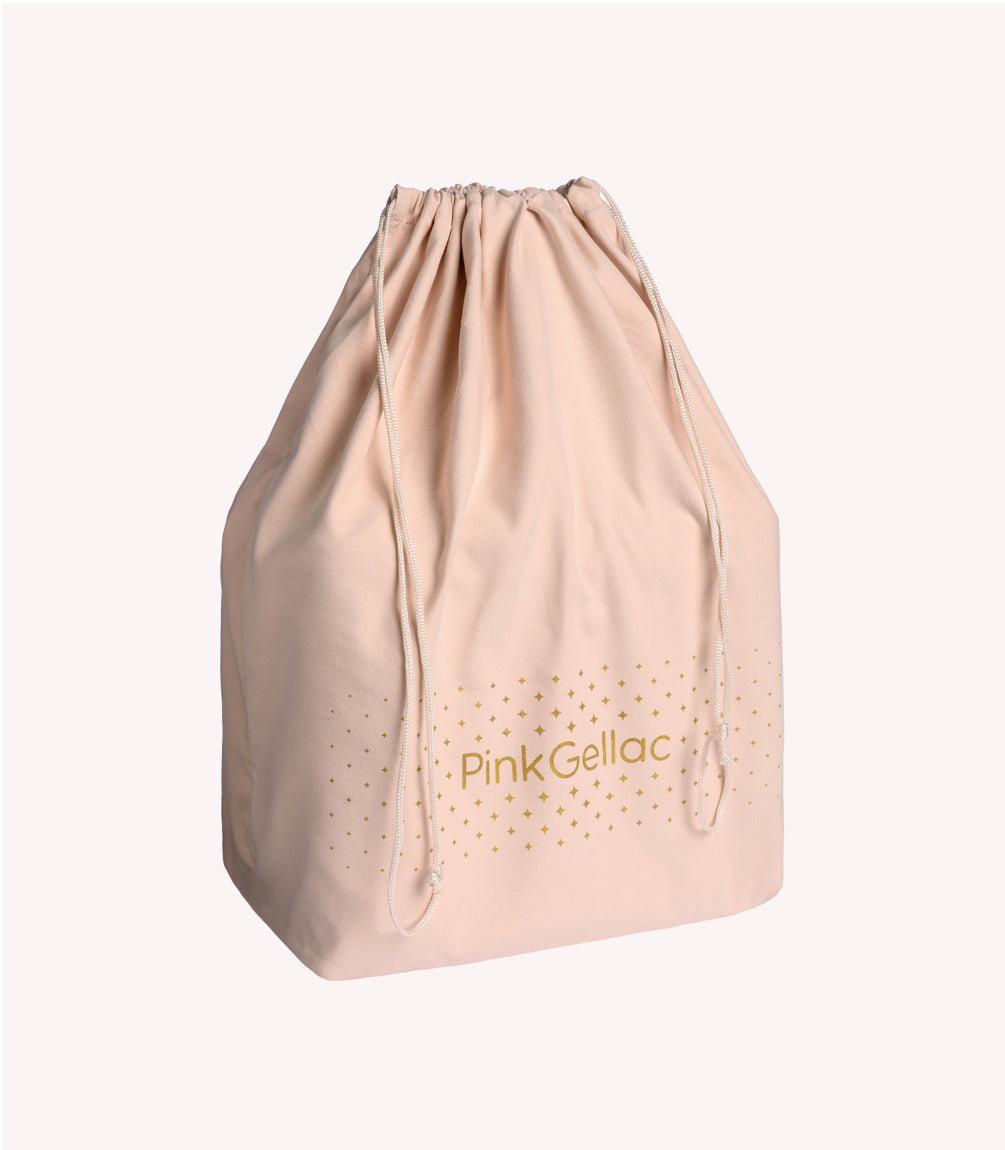Beige fabric bag with drawstring and the "Pink Gellac" logo printed in gold-colored text with small stars around it.