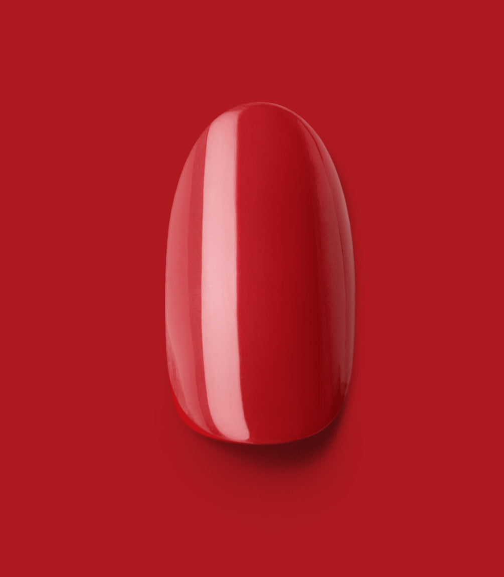 Close-up of a Pink Gellac 109 Lipstick Red press-on nail.