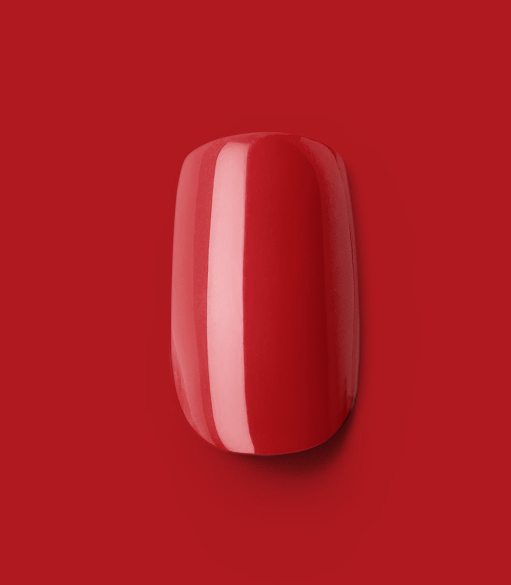 Close-up of a Pink Gellac 109 Lipstick Red press-on nail.