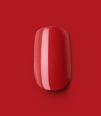 Close-up of a Pink Gellac 109 Lipstick Red press-on nail.