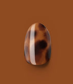 Close-up of a Pink Gellac 2007 Tortoise Touch press-on nail.
