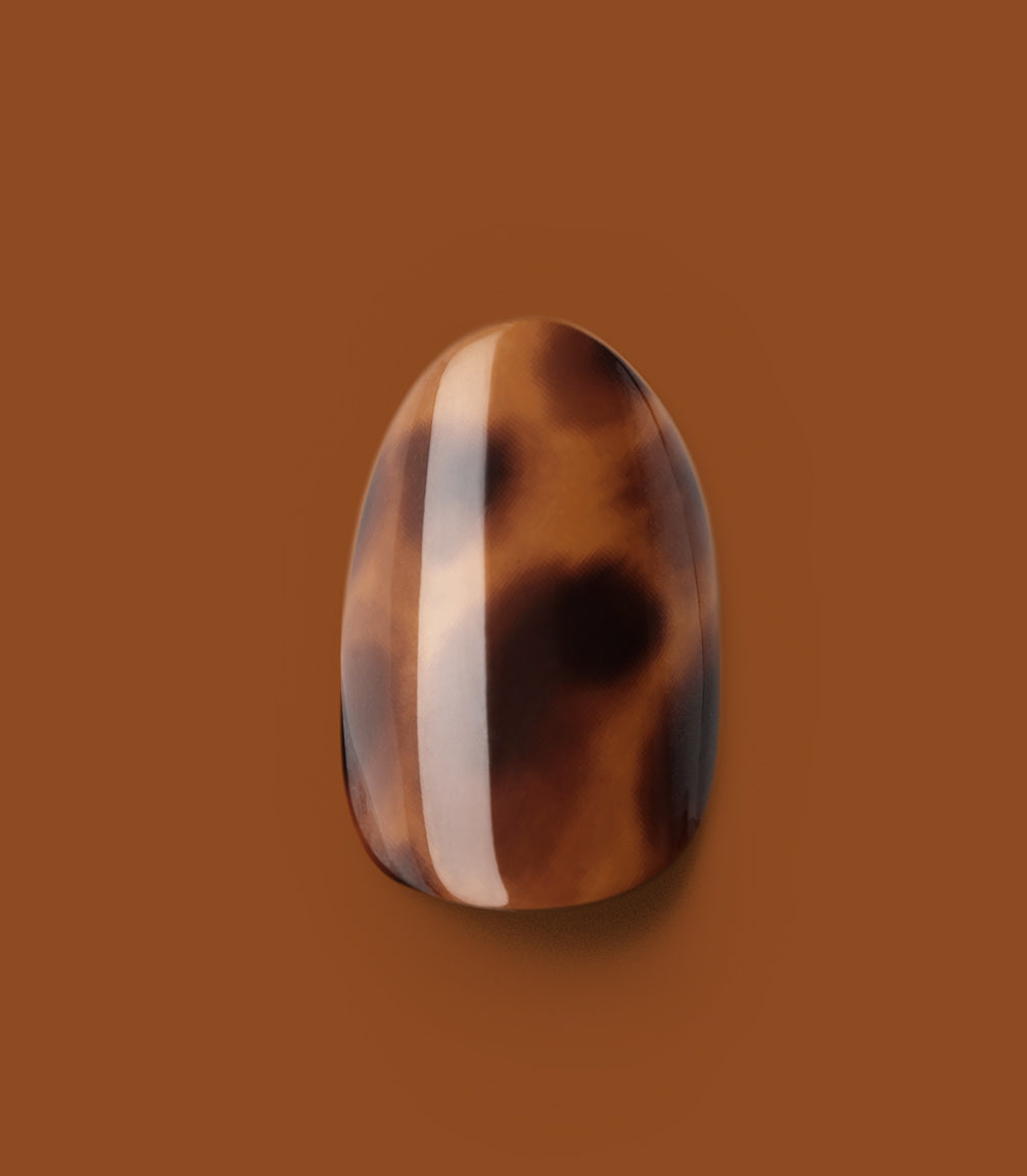 Close-up of a Pink Gellac 2007 Tortoise Touch press-on nail.