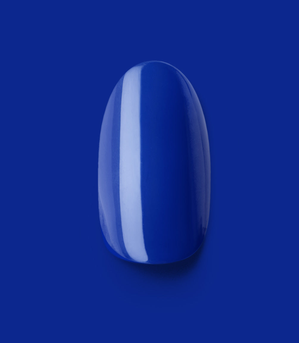 Close-up of a Pink Gellac 221 Delighted Blue press-on nail.