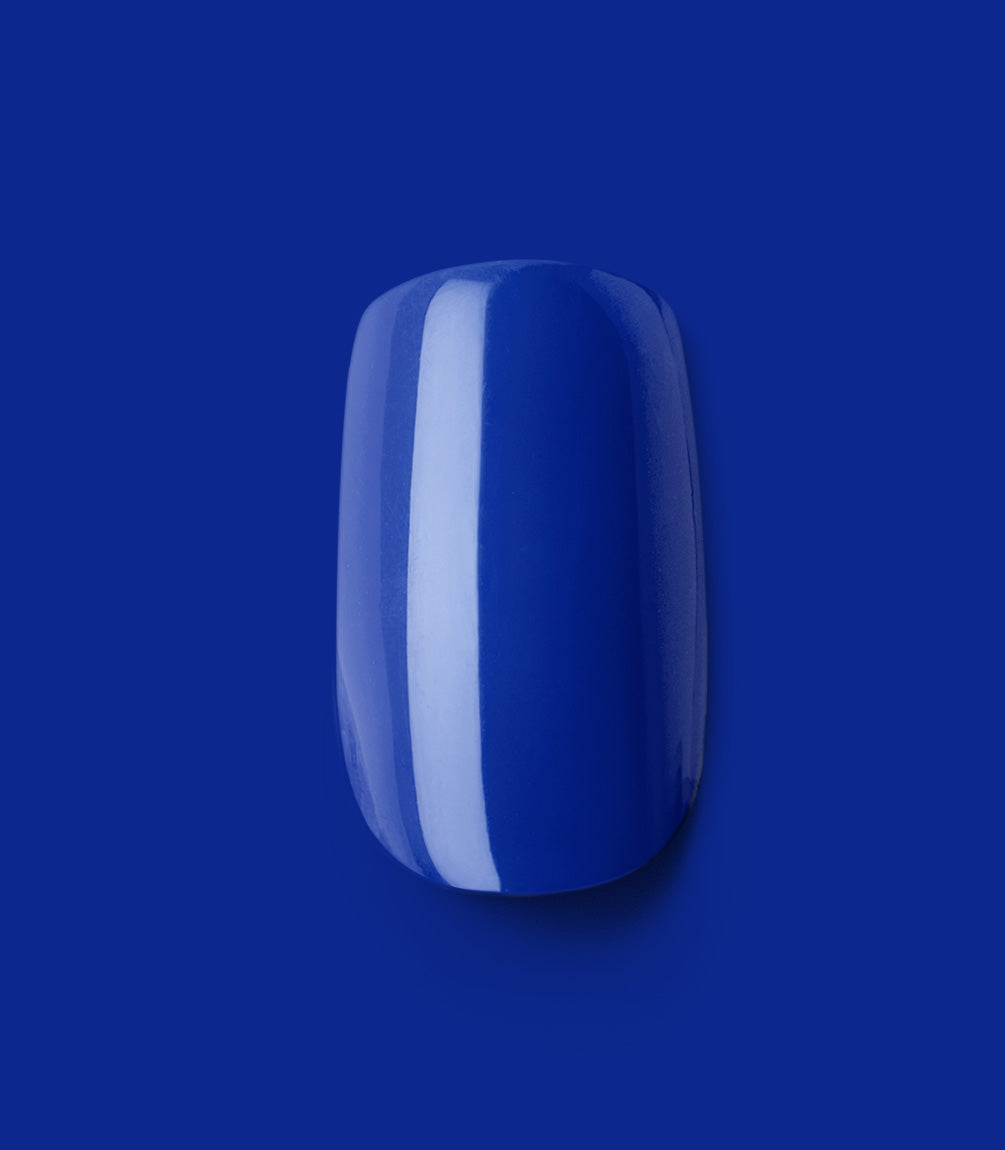 Close-up of a Pink Gellac 221 Delighted Blue press-on nail.