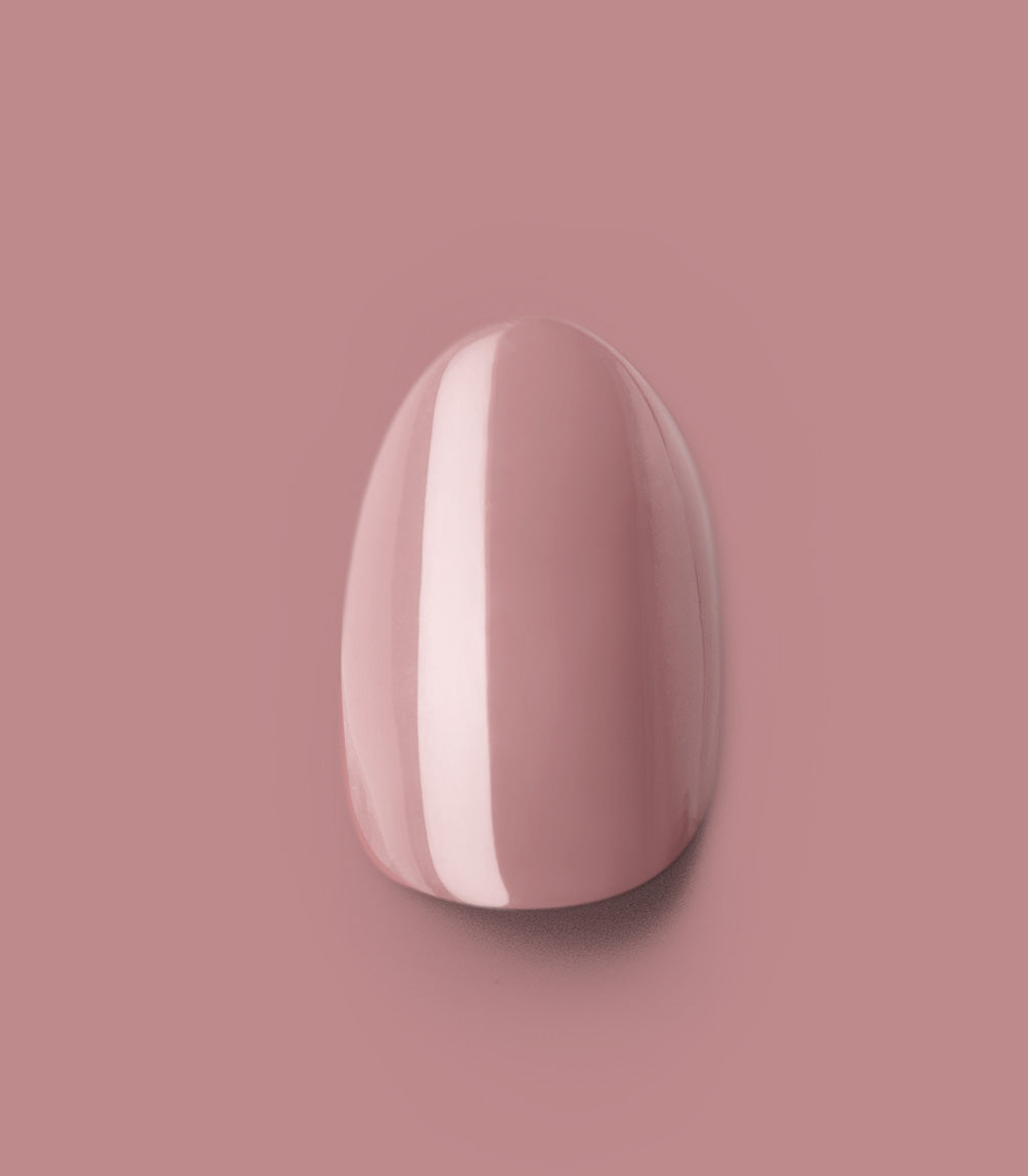 Close-up of a Pink Gellac 305 Pearly Nude press-on nail.
