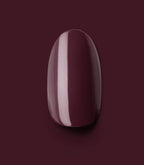 Close-up of a Pink Gellac 332 Sangria Red press-on nail.
