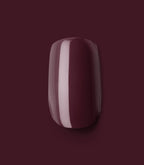 Close-up of a Pink Gellac 332 Sangria Red press-on nail.