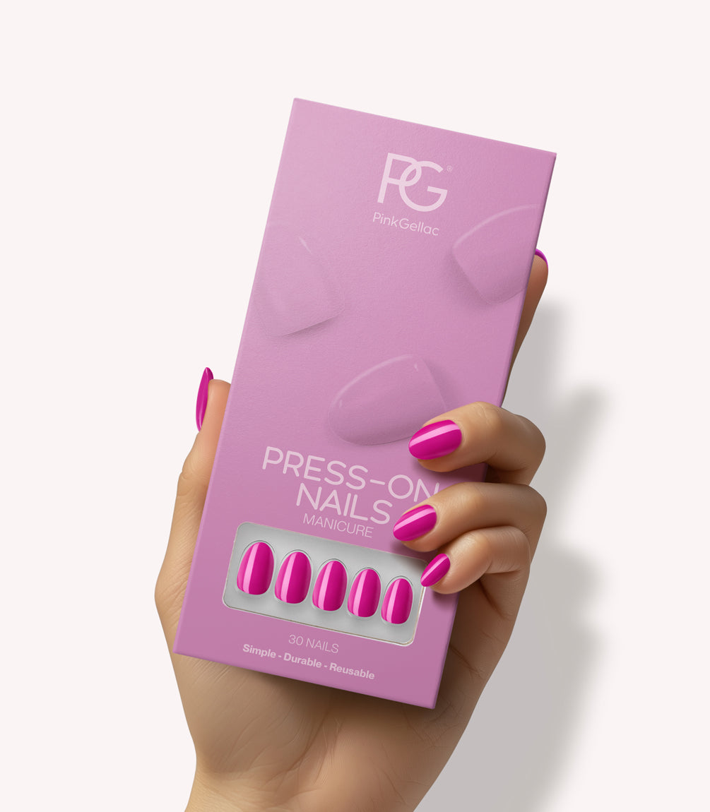 Hand holding Pink Gellac 368 Intense Plum press-on nails in their packaging.