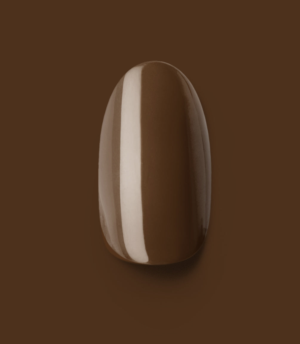 Close-up of a Pink Gellac 421 Mocha Brown press-on nail.