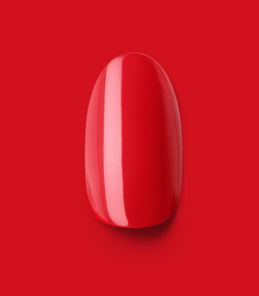 Close-up of a Pink Gellac 430 Bombshell Red press-on nail.
