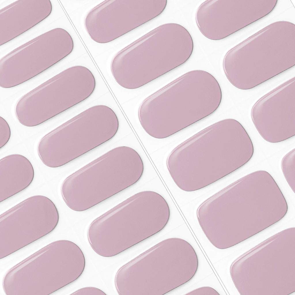 Model holding two Pink Gellac Value Pack 041 Soft Mauve sticker packs.