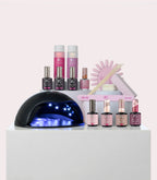 Alt-tag: A collection of nail care products including a UV lamp, several bottles of nail polish, nail files and manicure accessories on a white display.