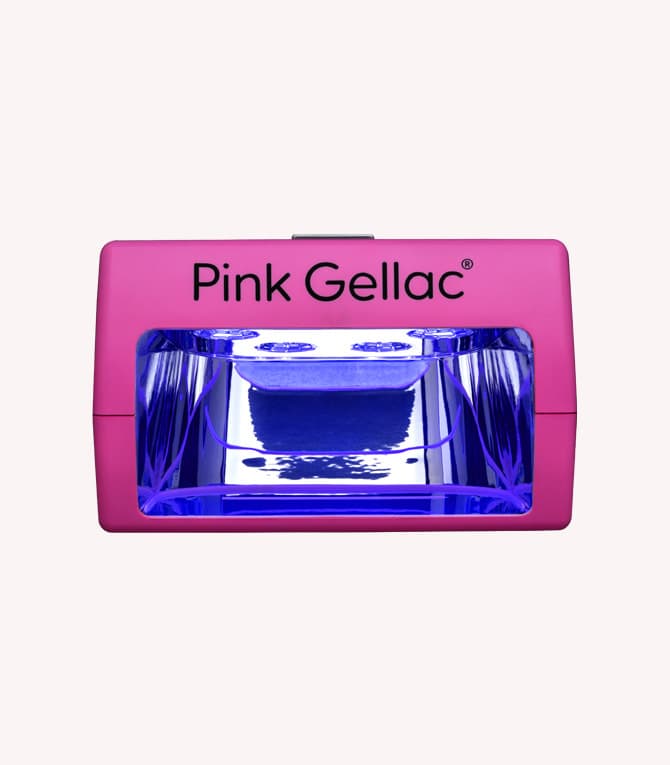 Pink nail dryer with blue LED lighting, brand name "Pink Gellac" on it.