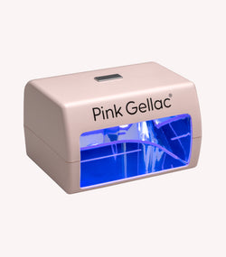 Beige nail dryer with the text "Pink Gellac" and a blue LED light opening.