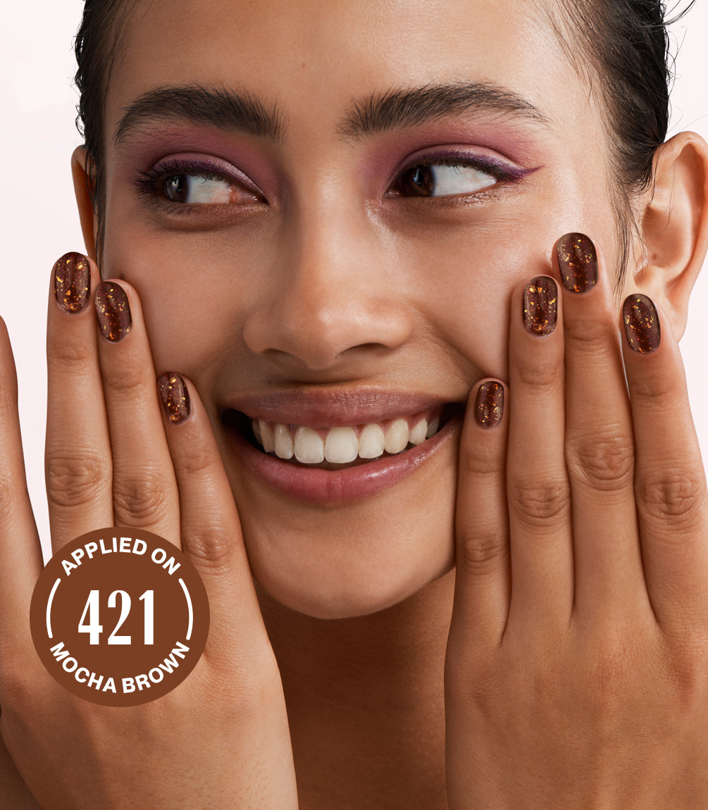 Close-up of Pink Gellac Effect Coat Supreme Gold gel polish texture.