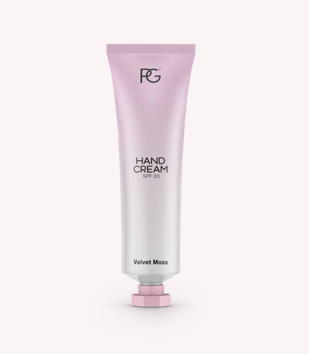 Pink tube of hand cream with SPF 20, product name Velvet Moss.
