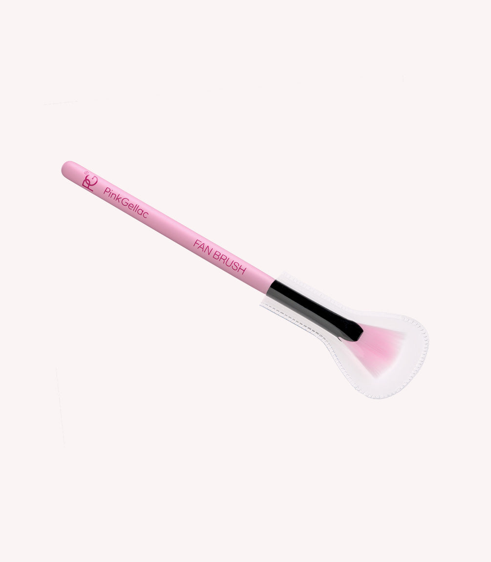 Pink fan brush with plastic cover and the inscription "Pink Gellac Fan Brush".
