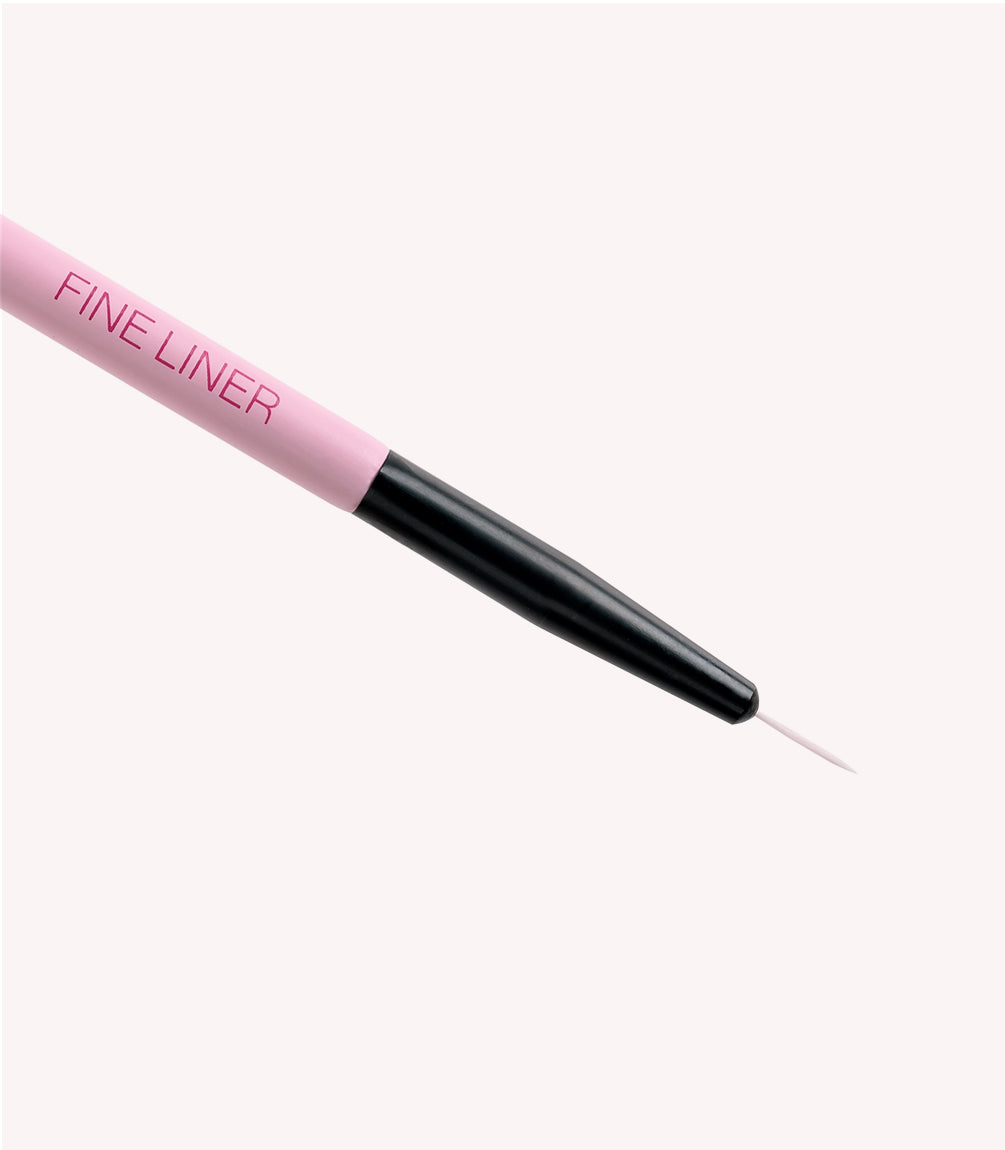 Pink brush with black grip and the label "Fine Liner" on a white background.