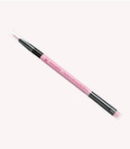 Pink manicure brush with black tips for French manicure.