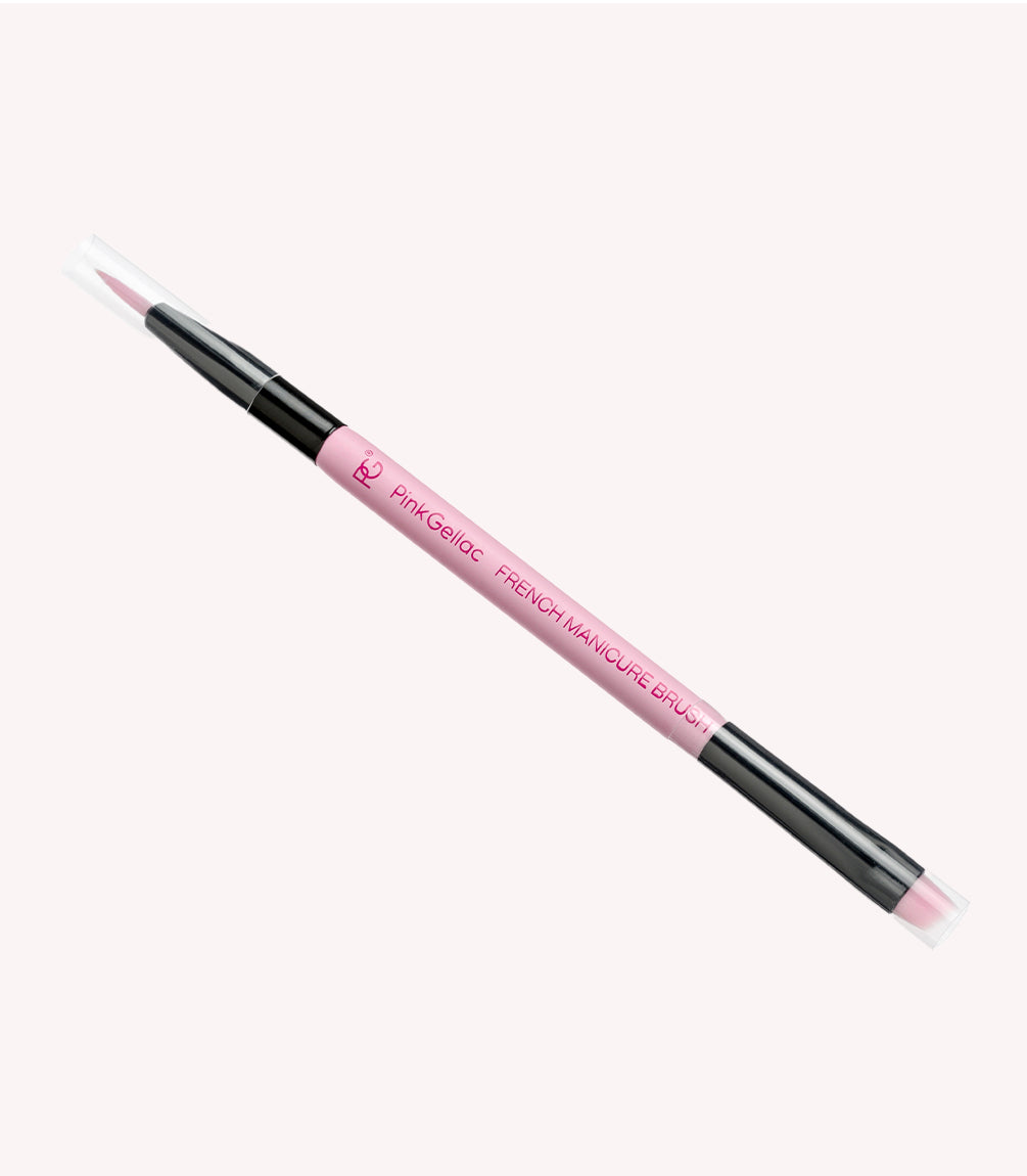 Pink manicure brush with black tips for French manicure.
