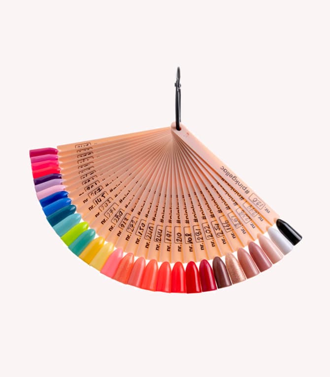 Fan-shaped color swatch with different shades of nail polish on a ring.