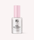 Bottle of nail restorer with pink cap and black inscription "Nail Recovery Nail Treatment".