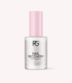 Bottle of nail restorer with pink cap and black inscription "Nail Recovery Nail Treatment".