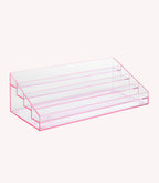 Transparent pink step-shaped display screen with five levels.