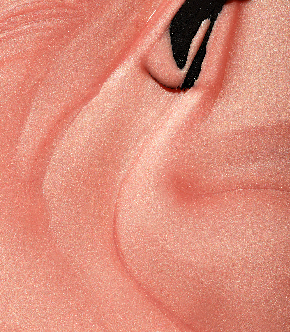 Close-up of Pink Gellac 458 Coastal Coral gel polish texture.